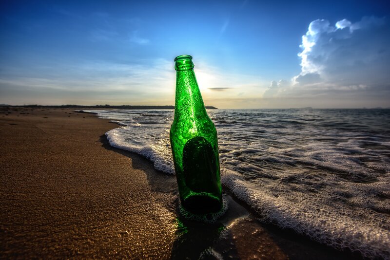 Green Bottle on Beach — Serene