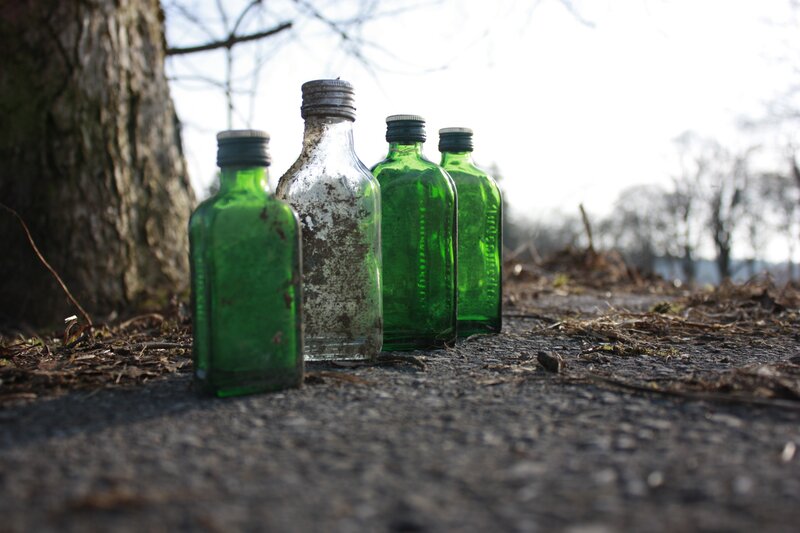 Green Bottles on Ground