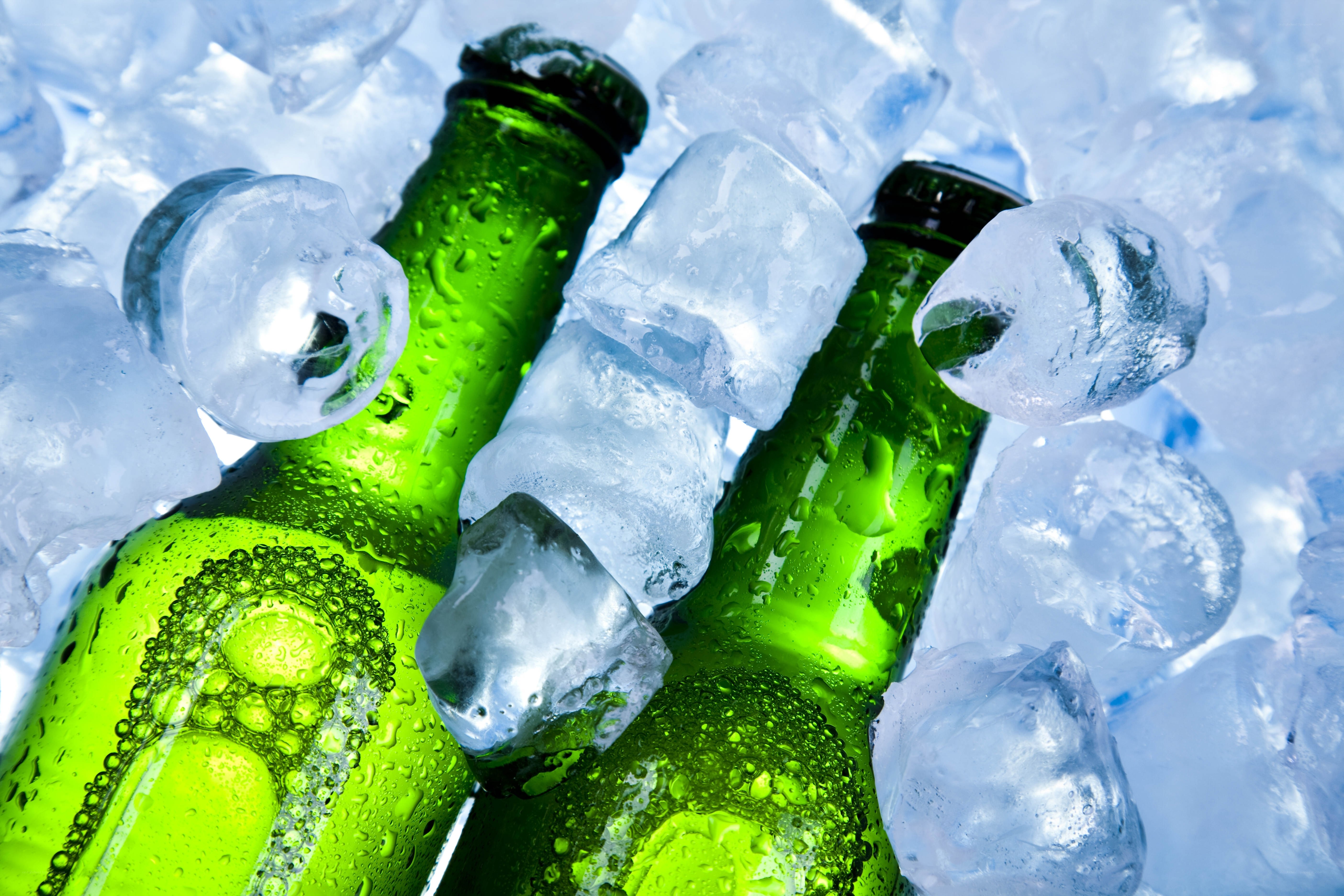 green bottles with ice cubes