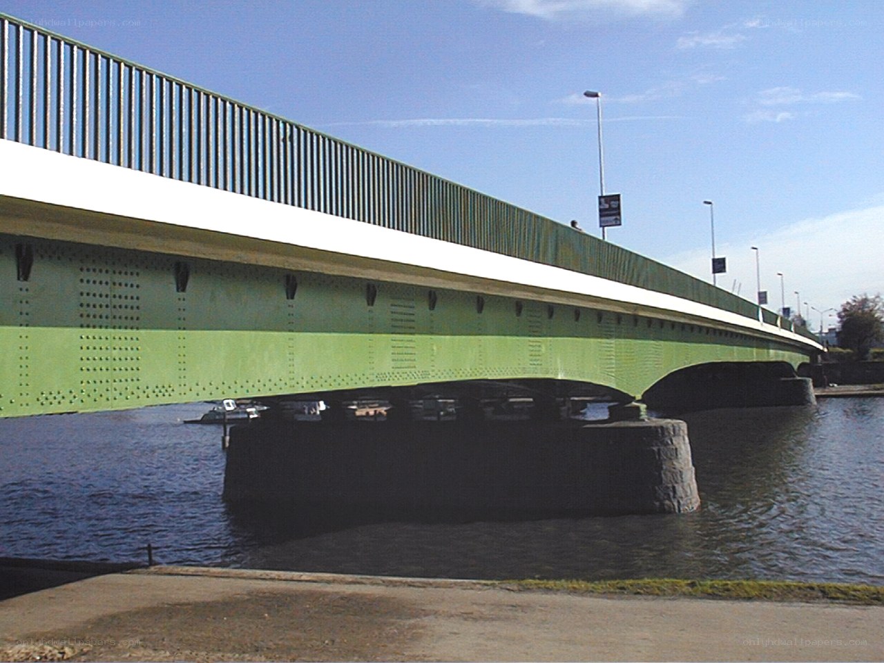 green bridge over river
