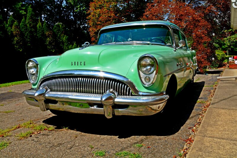 Green Buick Car — Serene