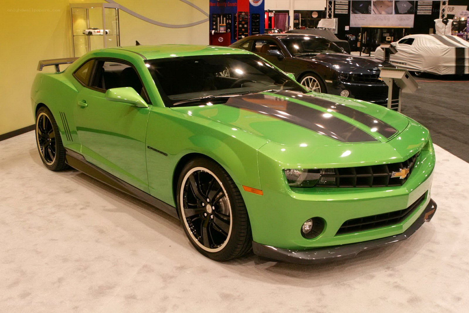 Green Camaro at auto show