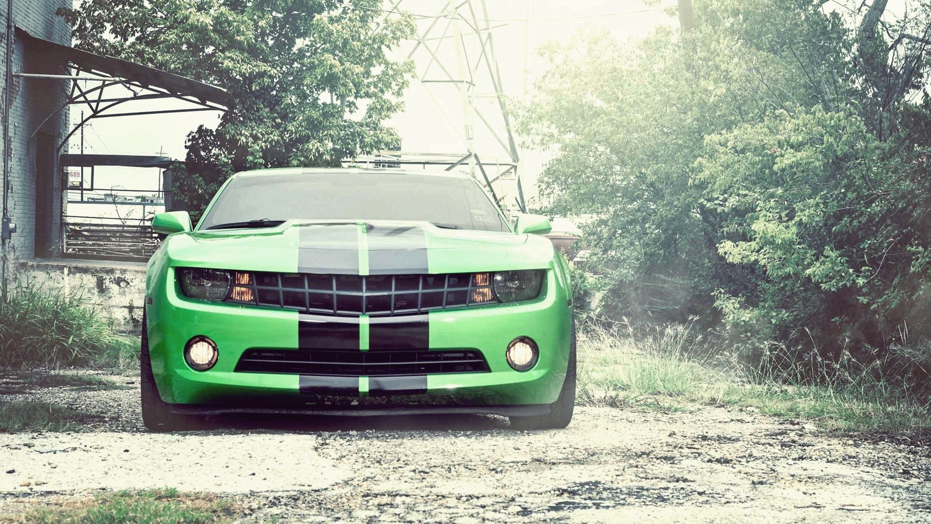 green camaro in industrial setting