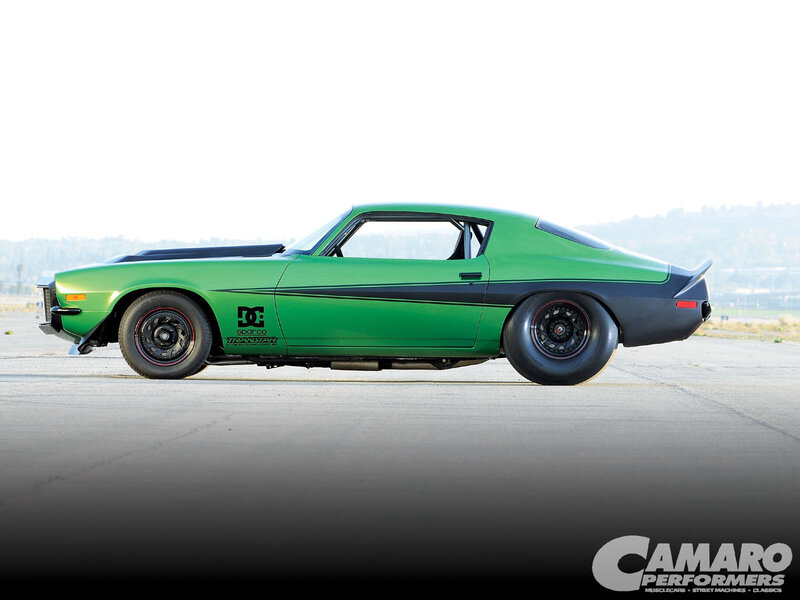 green camaro muscle car