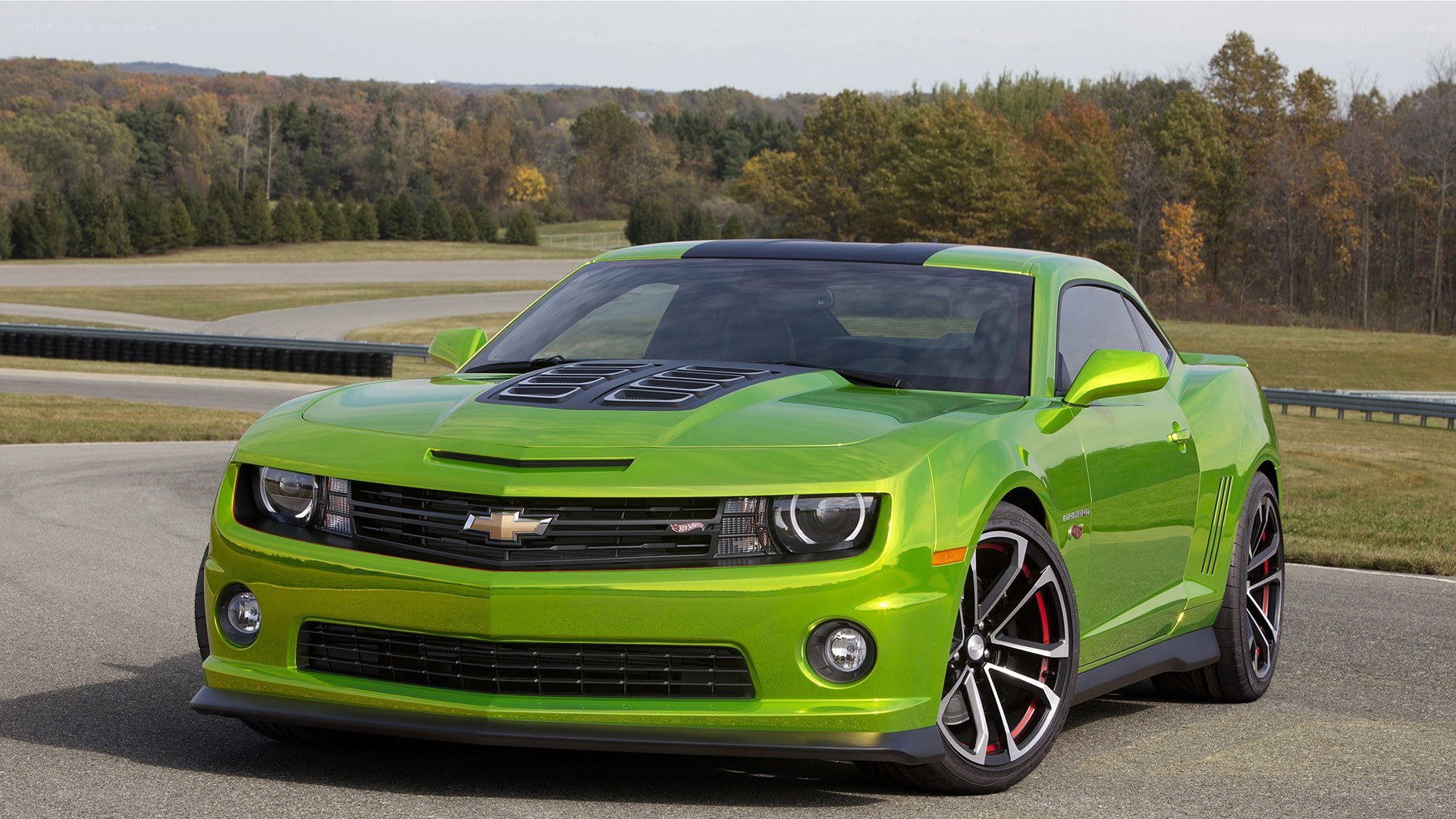 green camaro on racetrack