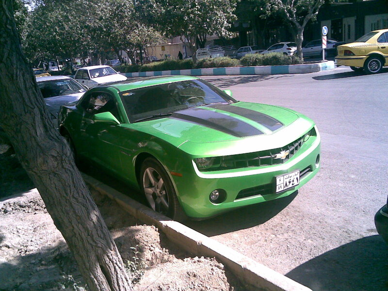 green camaro on street