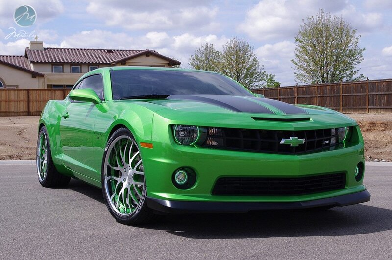 green camaro with custom wheels