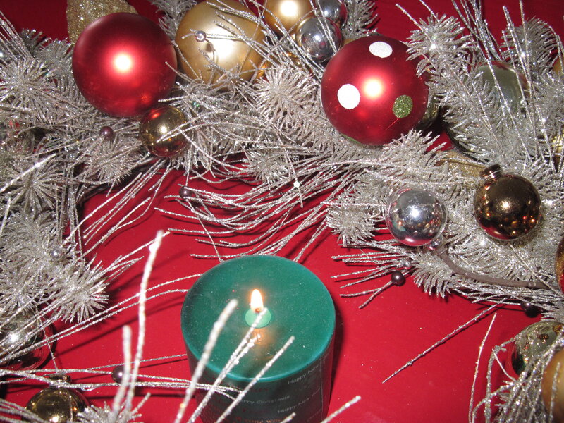 Green Candle with Ornaments