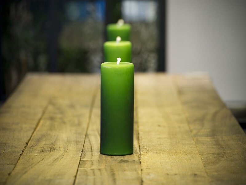 Green Candles on Wood