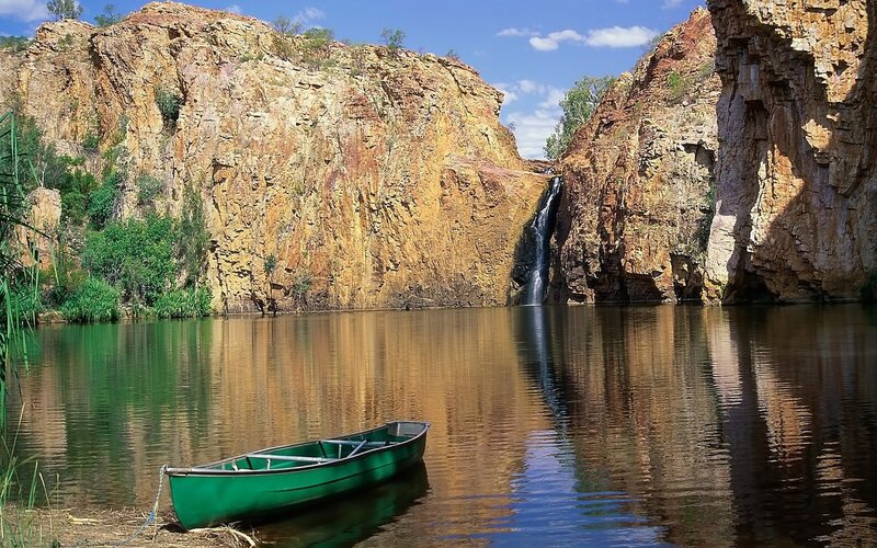 Green Canoe in Lake