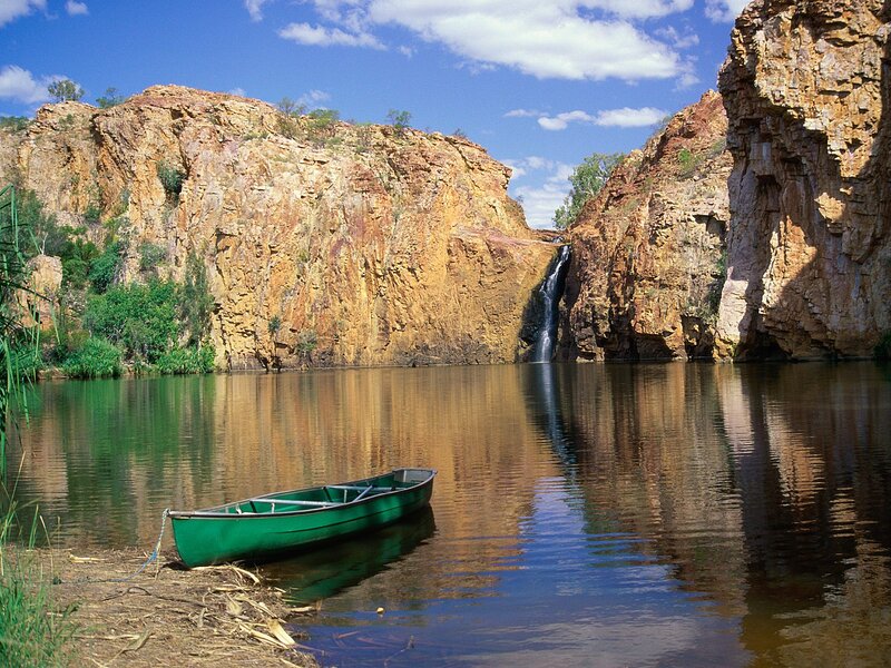 Green Canoe in River — Blue, Serene