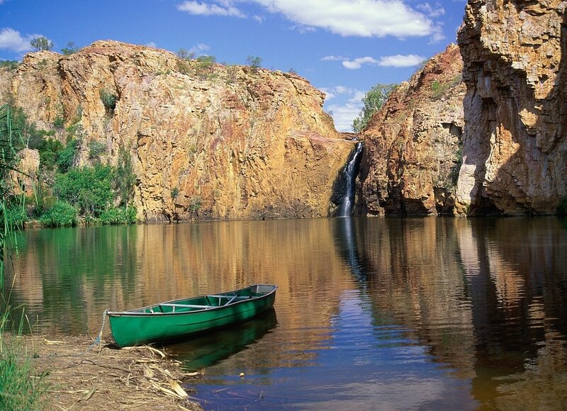 Green Canoe in River