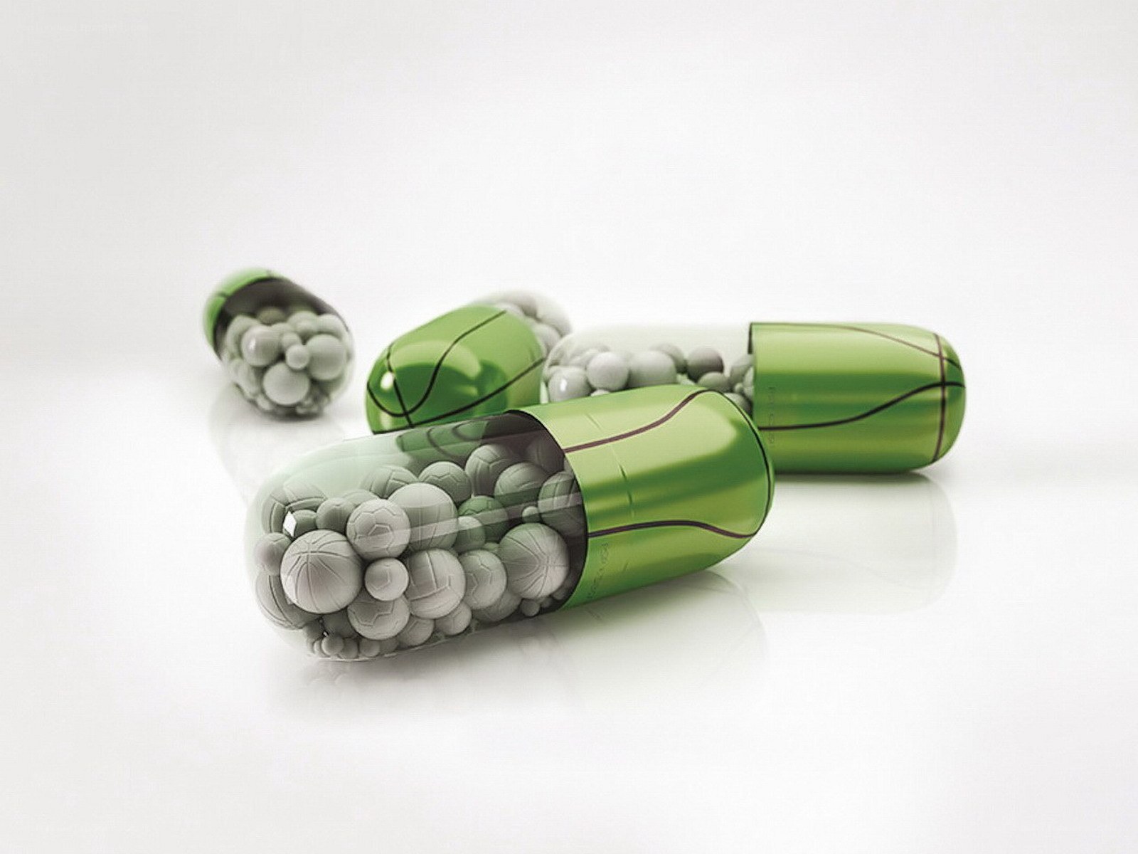 green capsules with balls