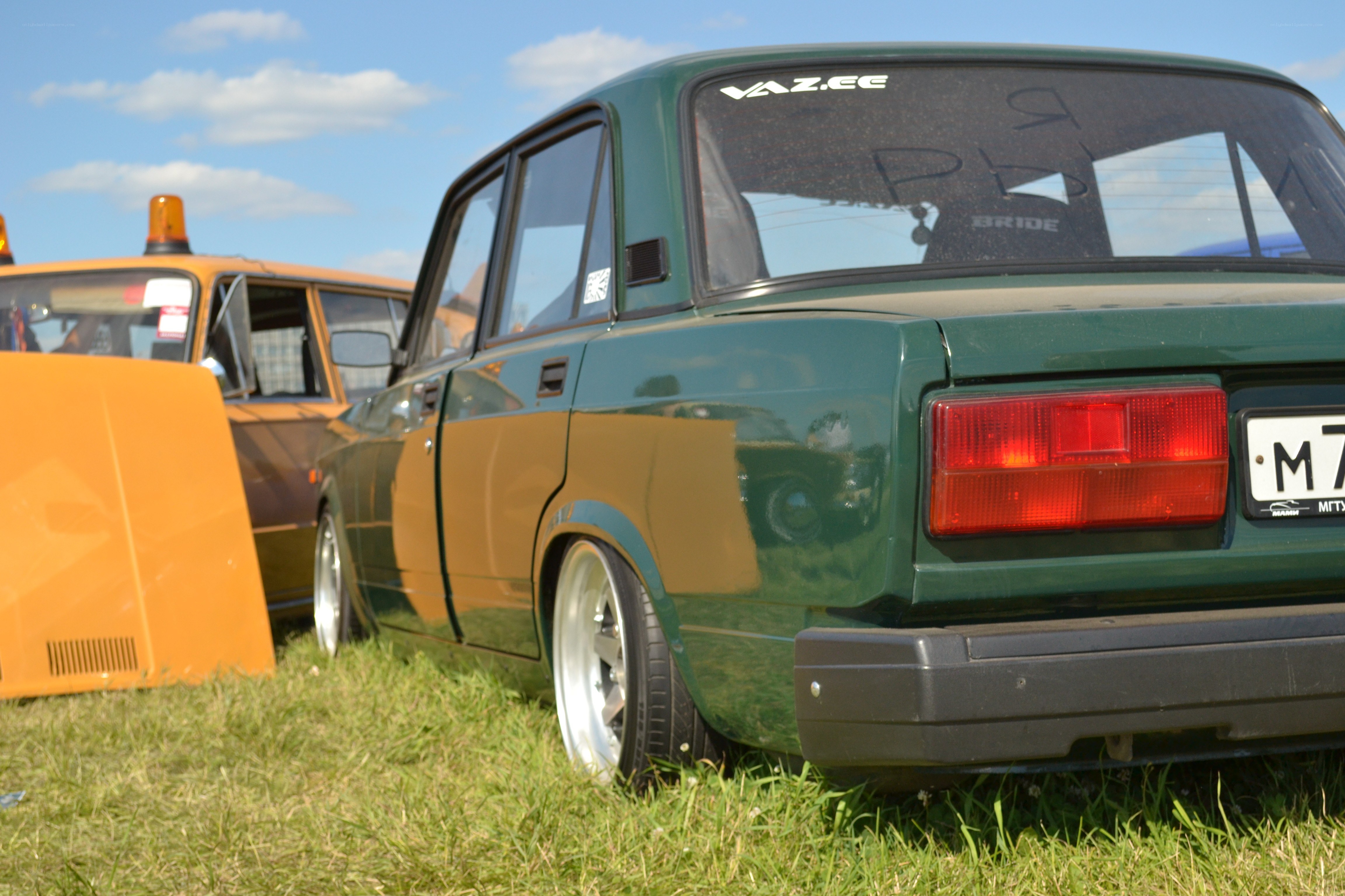 green car at outdoor event