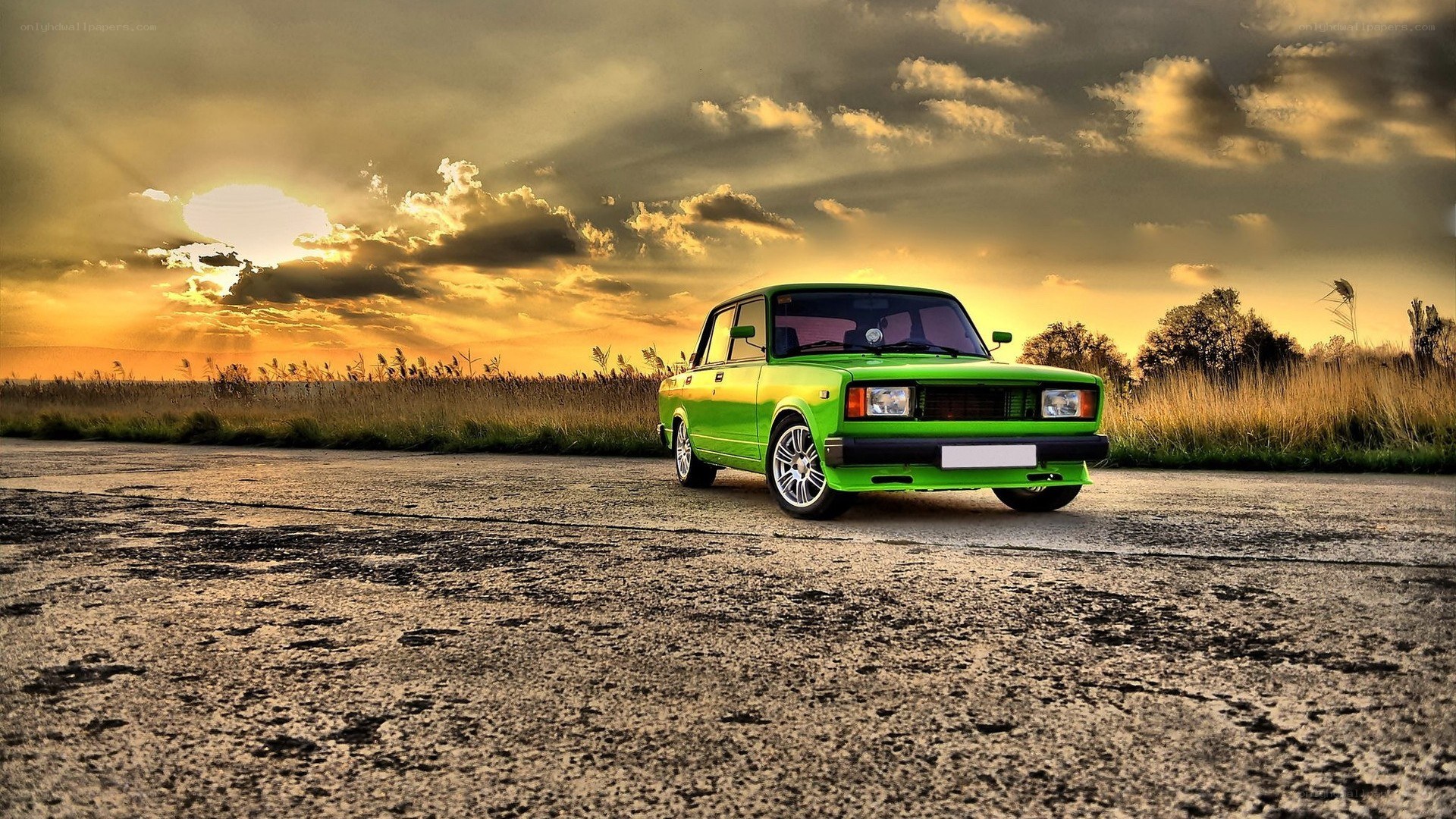 green car at sunset