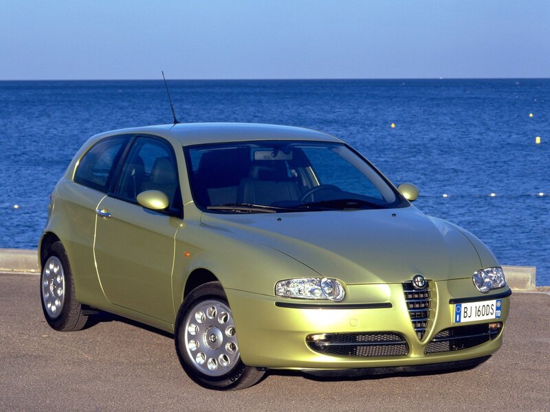 green car by the sea