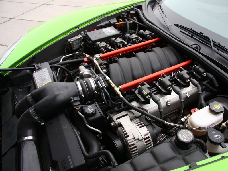 green car engine bay