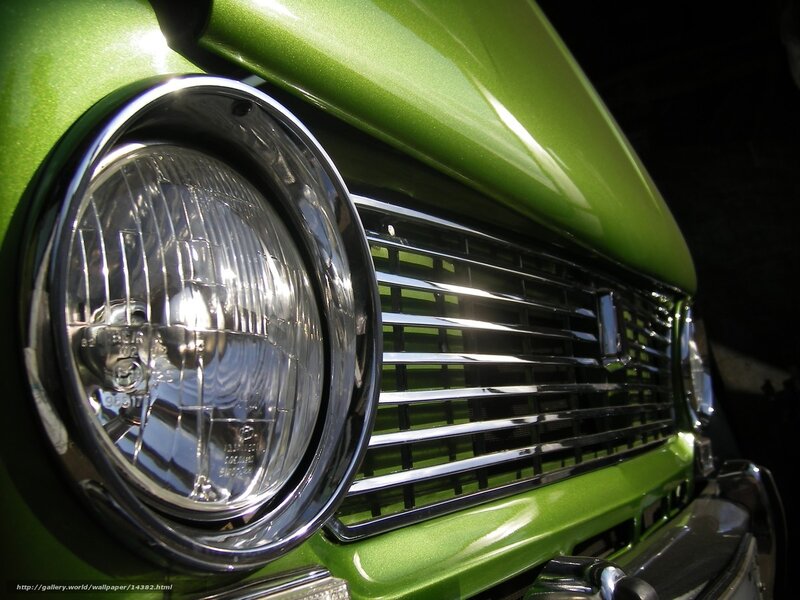 Green Car Headlight Close-Up