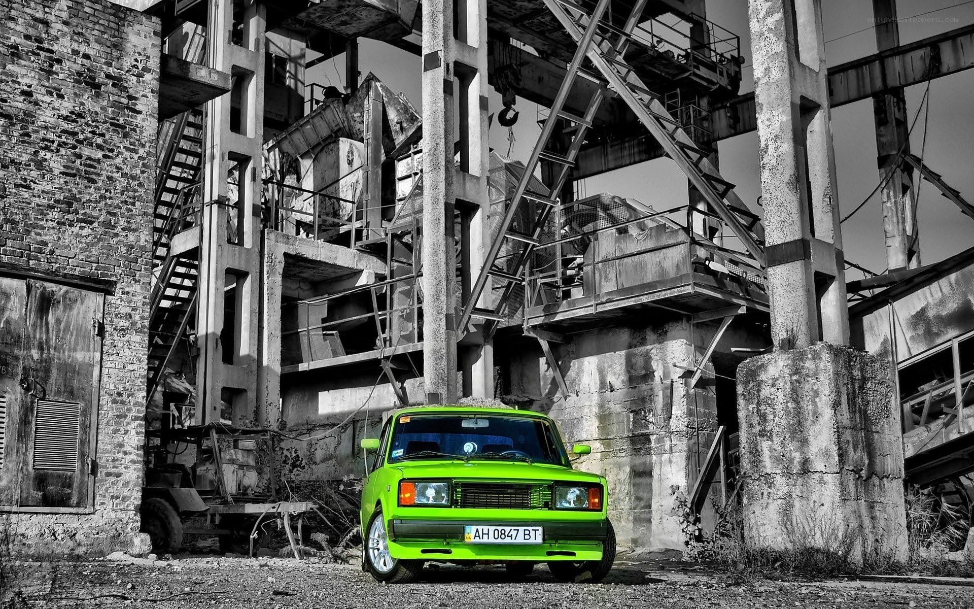 Green car in abandoned factory