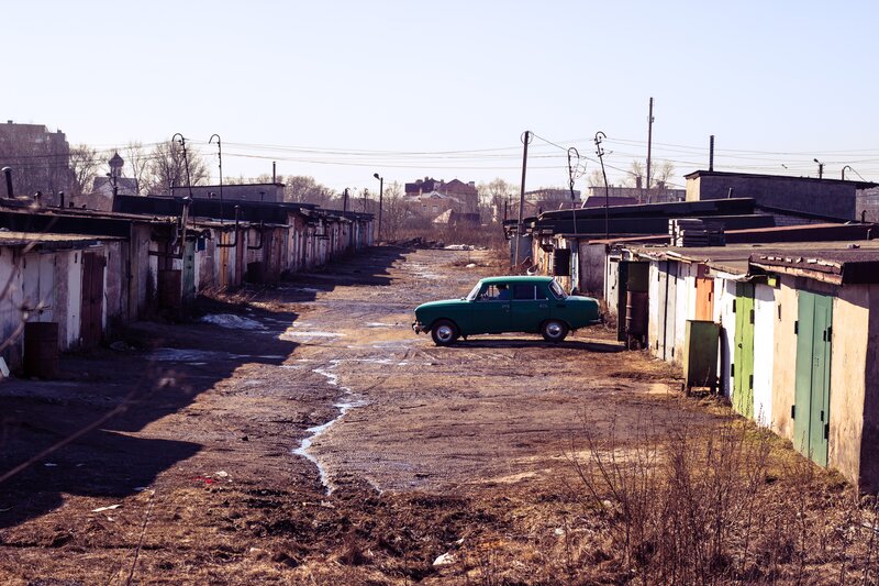 Green Car in Alley
