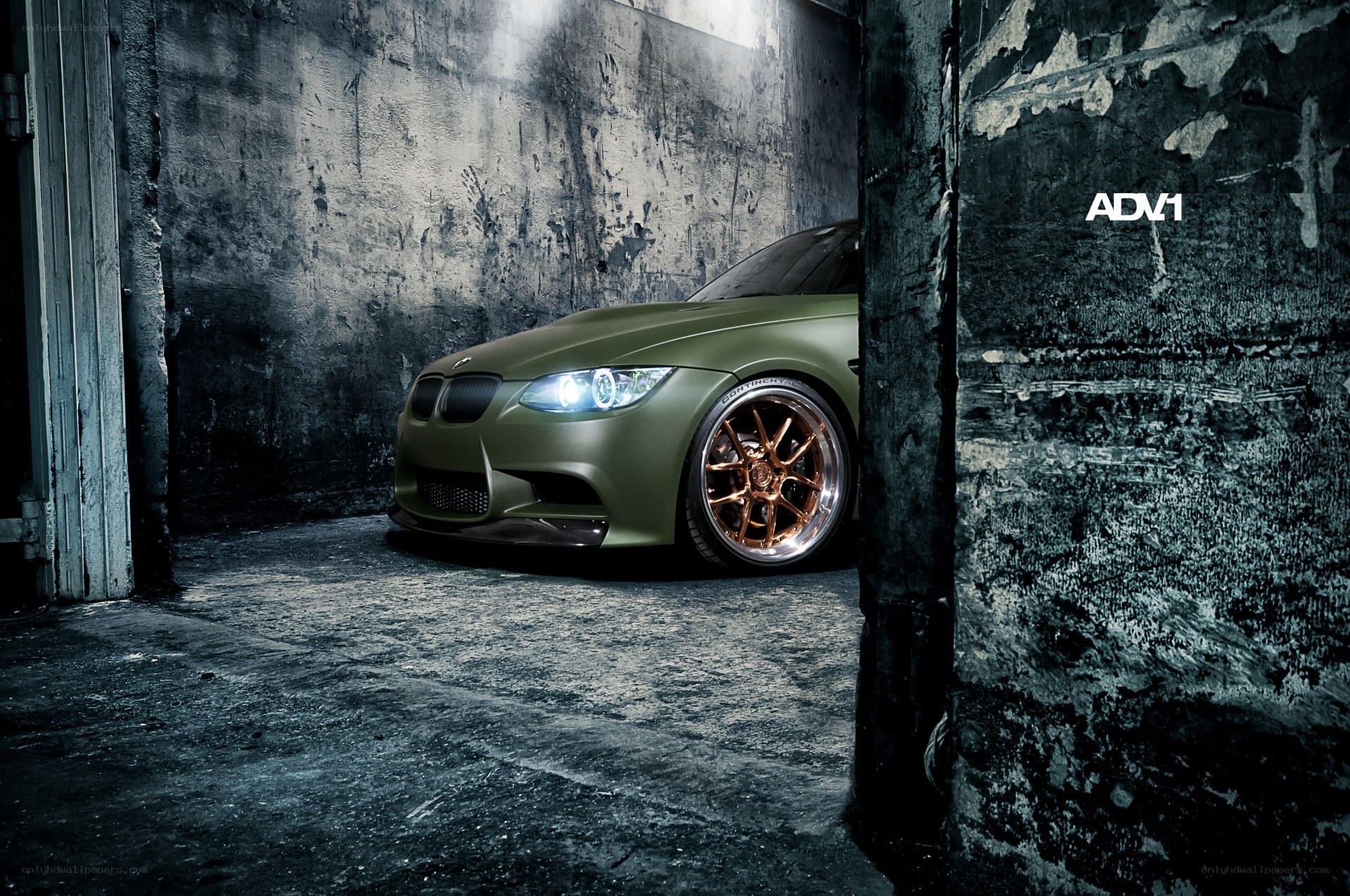 green car in dark garage