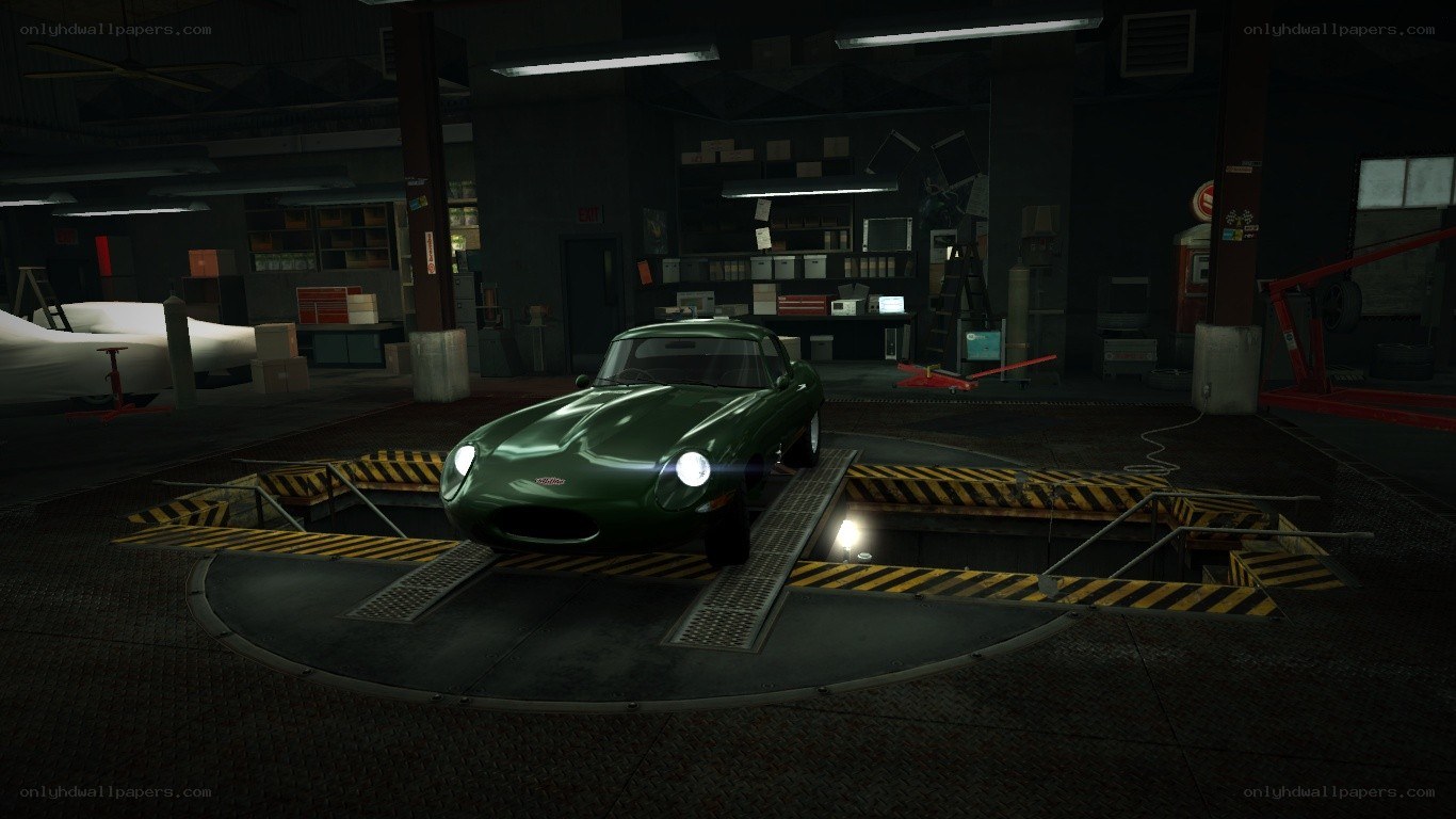 green car in garage