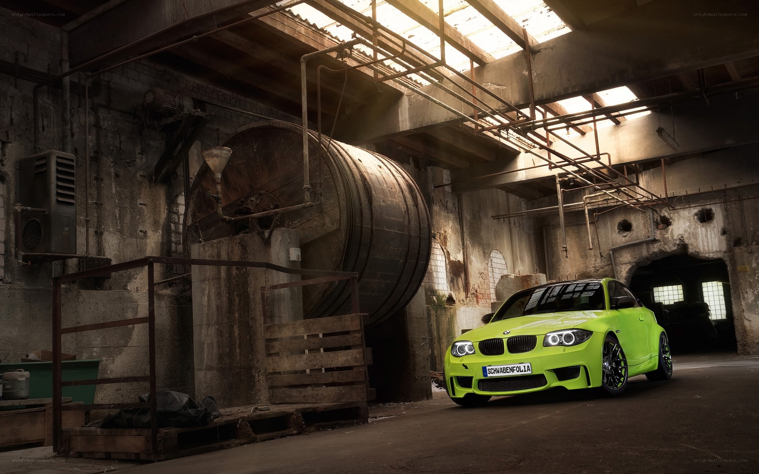 Green car in old factory