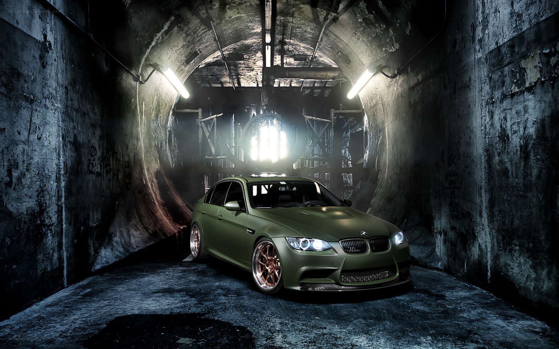 green car in tunnel