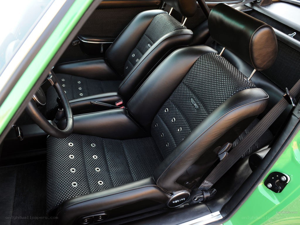 green car interior with black seats