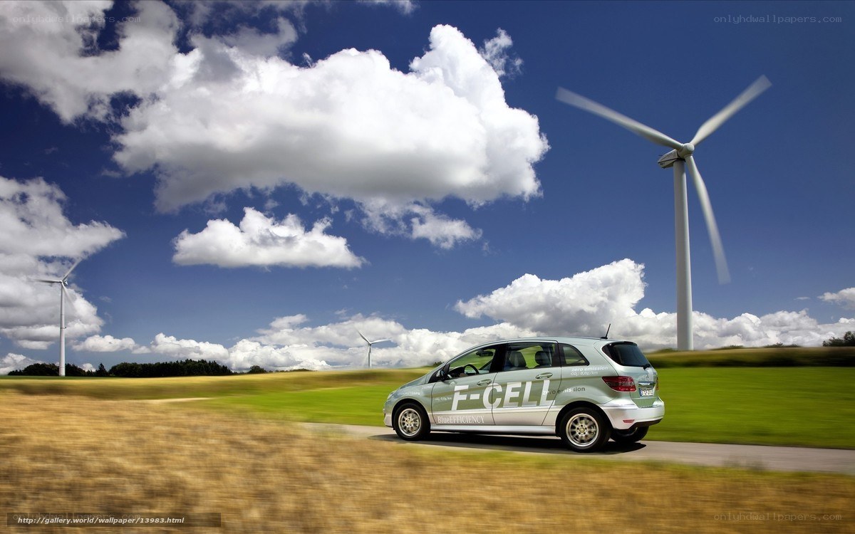 Green car on a country road