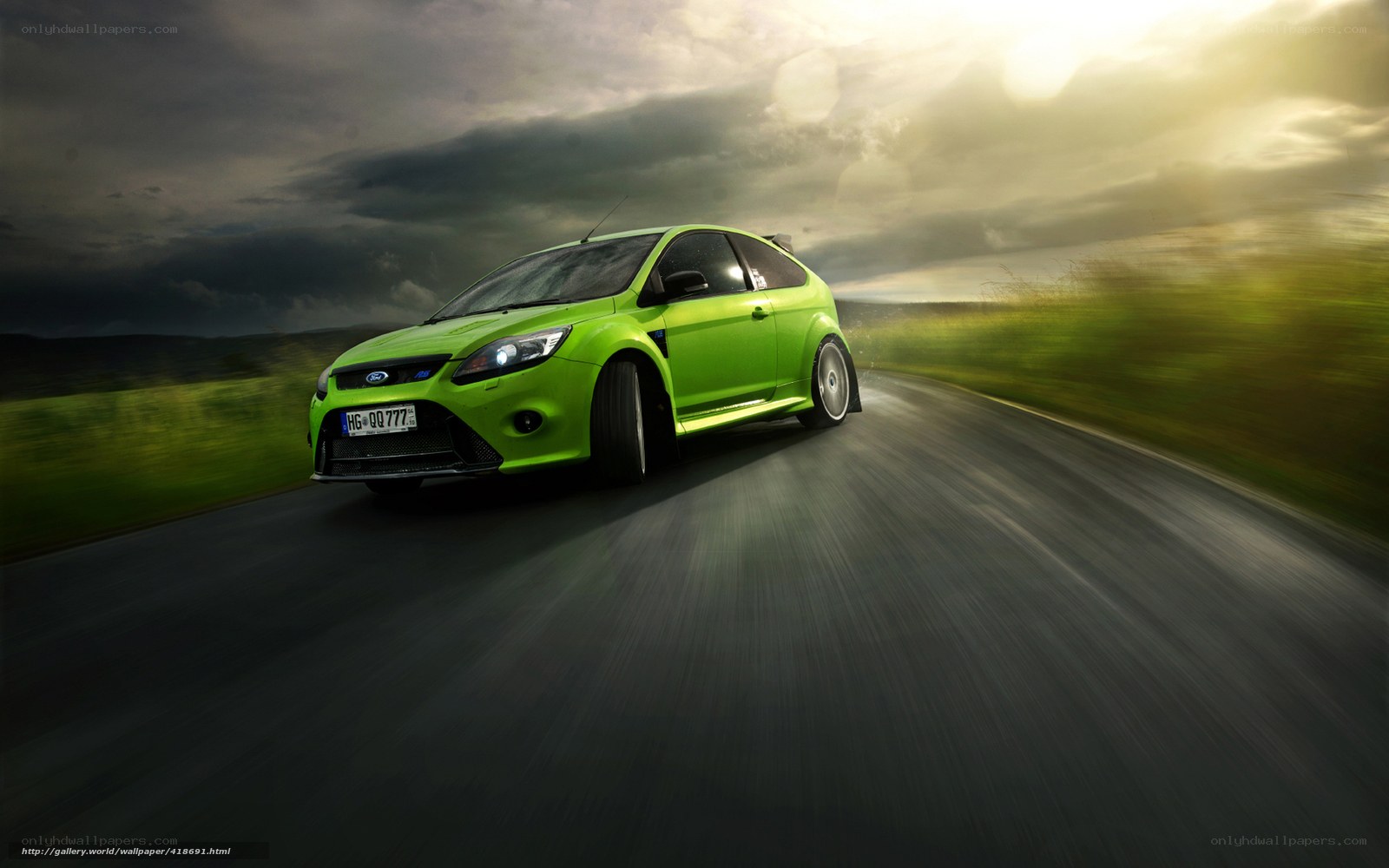 green car on a road