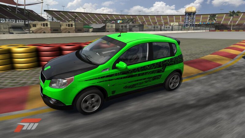 green car on racetrack