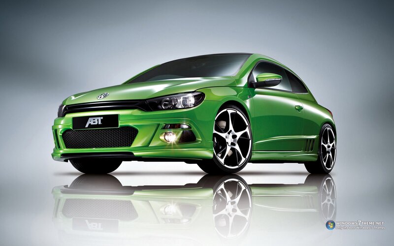 Green Car on Reflective Surface