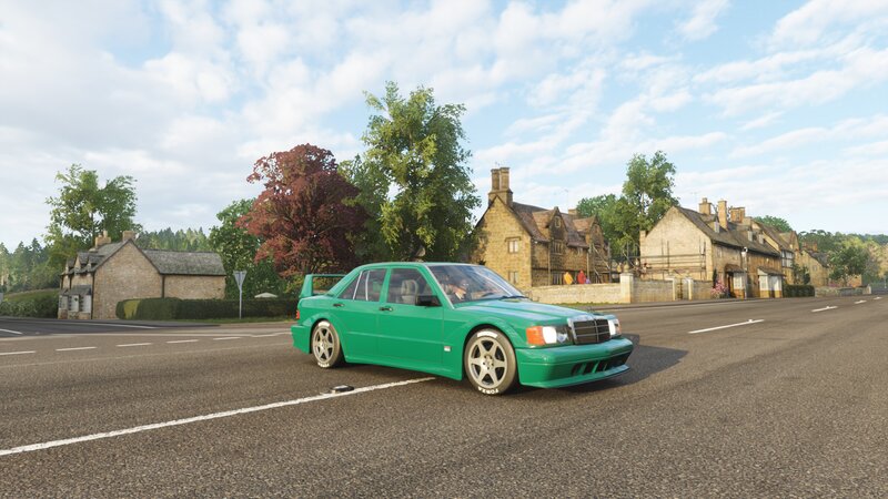 Green Car on Road — Calm, Afternoon