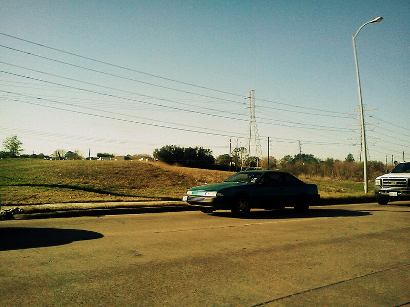 Green Car on Road — Calm