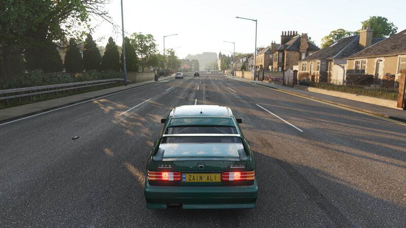 Green Car on Street