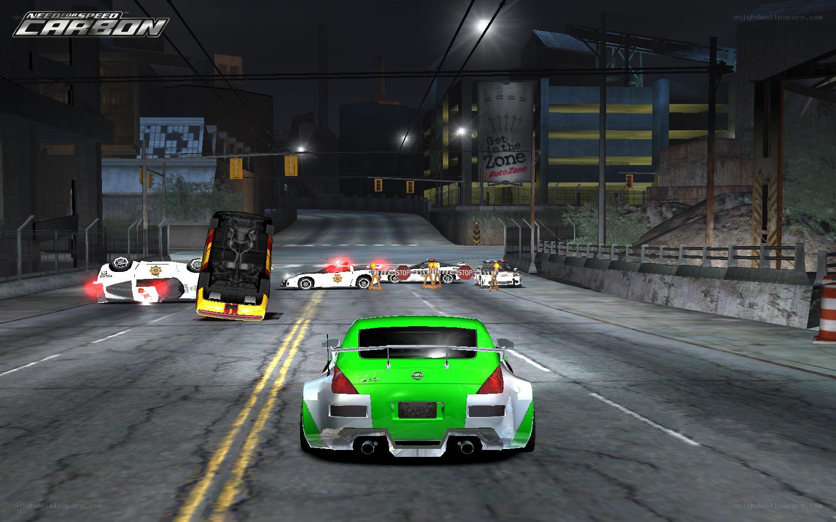 Green car racing at night