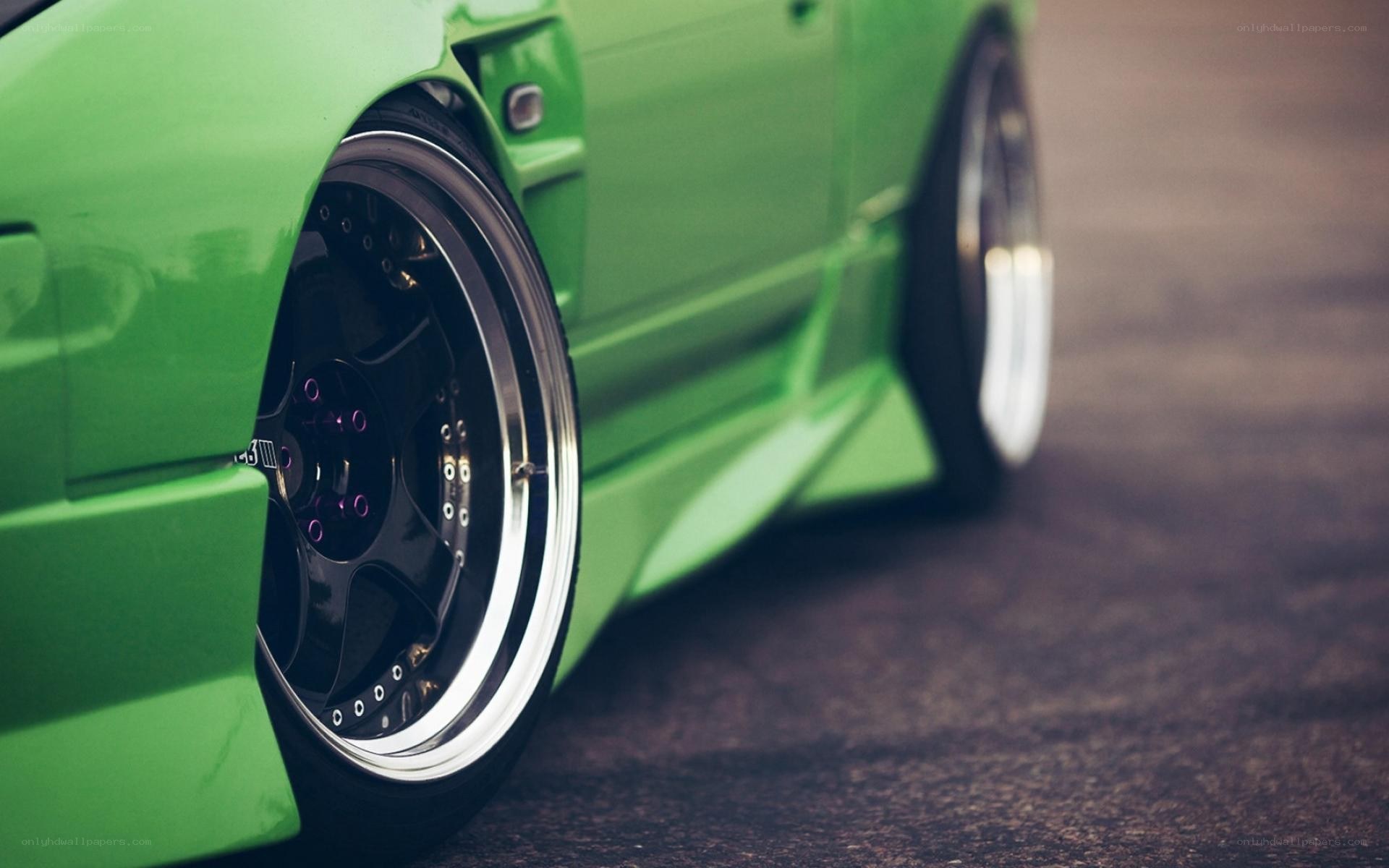 green car wheel close-up