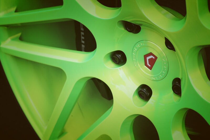 Green Car Wheel — Dramatic