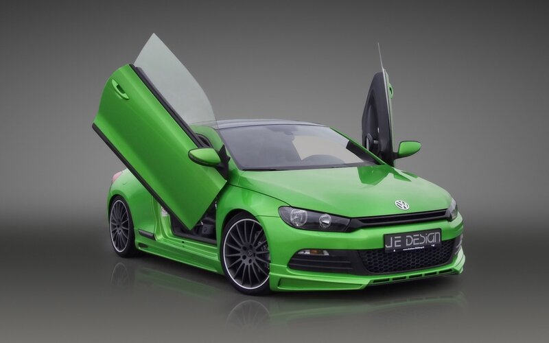 Green Car with Open Doors
