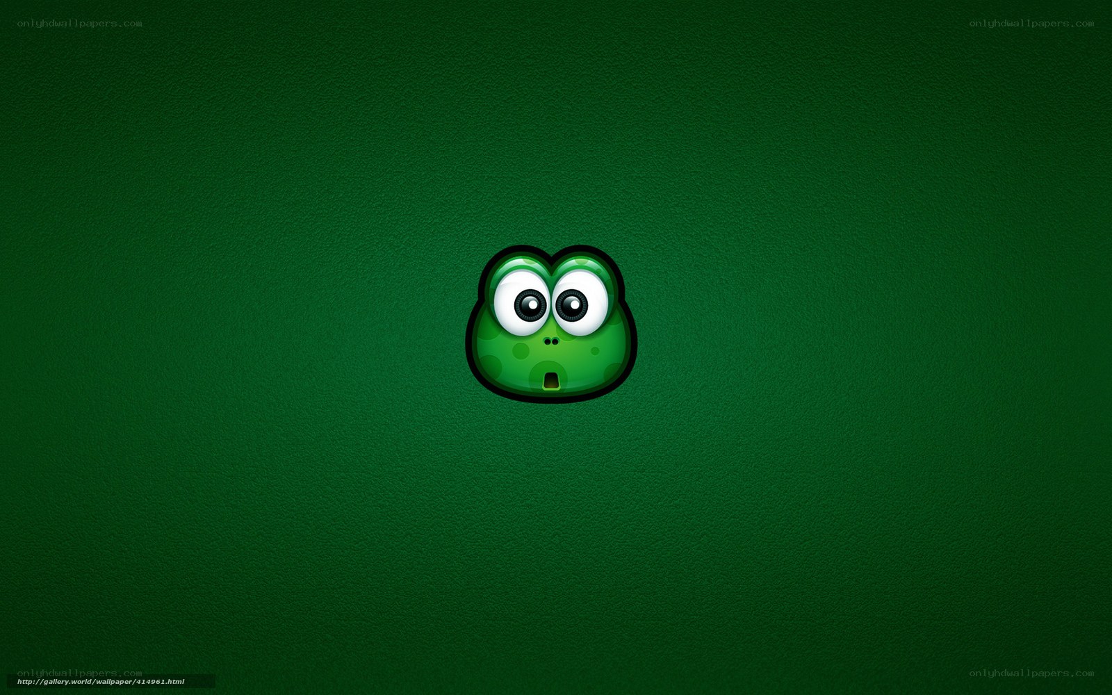green cartoon face on green background