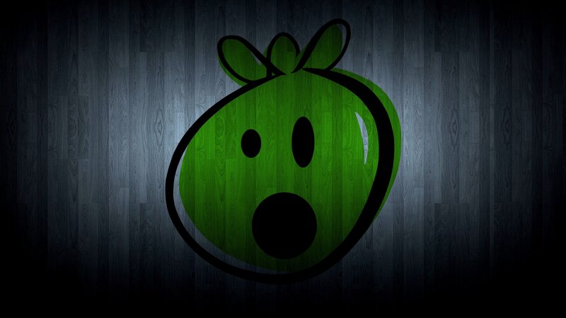 green character on wood