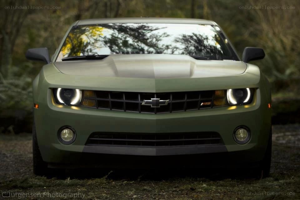 green chevrolet camaro front view