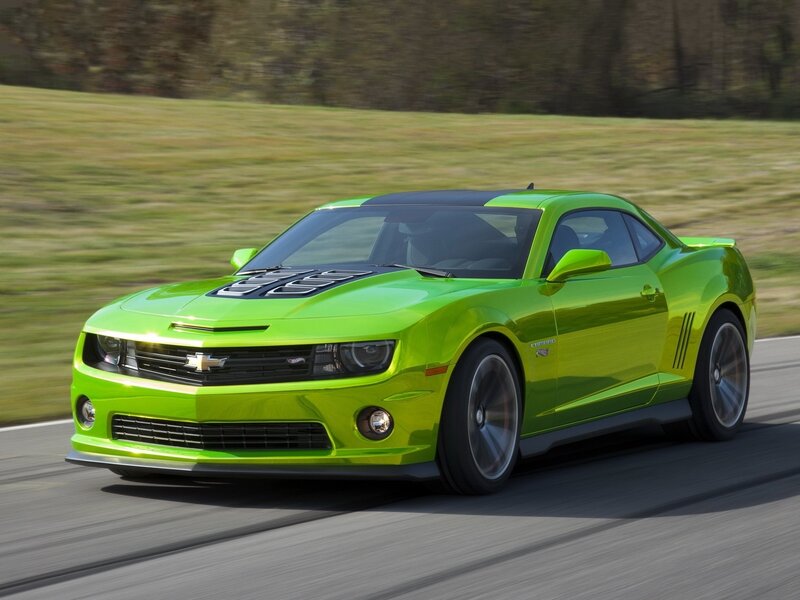 Green Chevrolet Camaro in motion