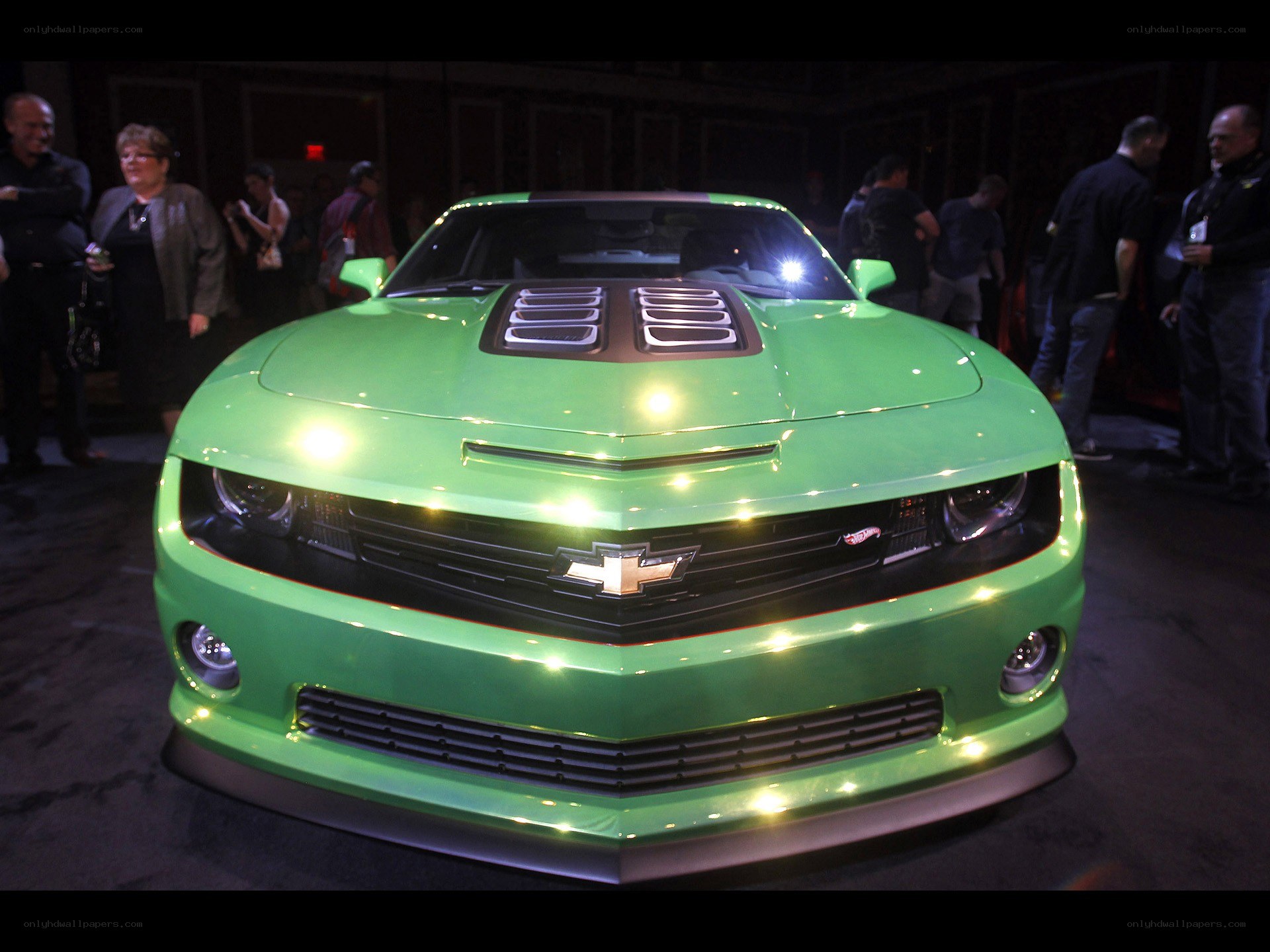 Green Chevrolet Camaro on display
