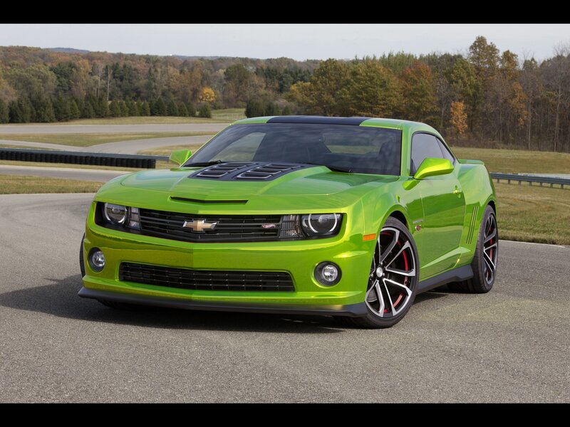 Green Chevrolet Camaro on racetrack