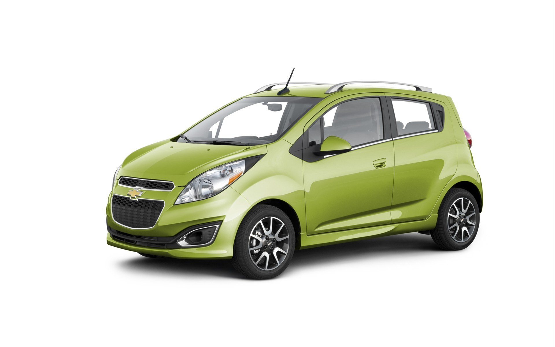green chevrolet spark car