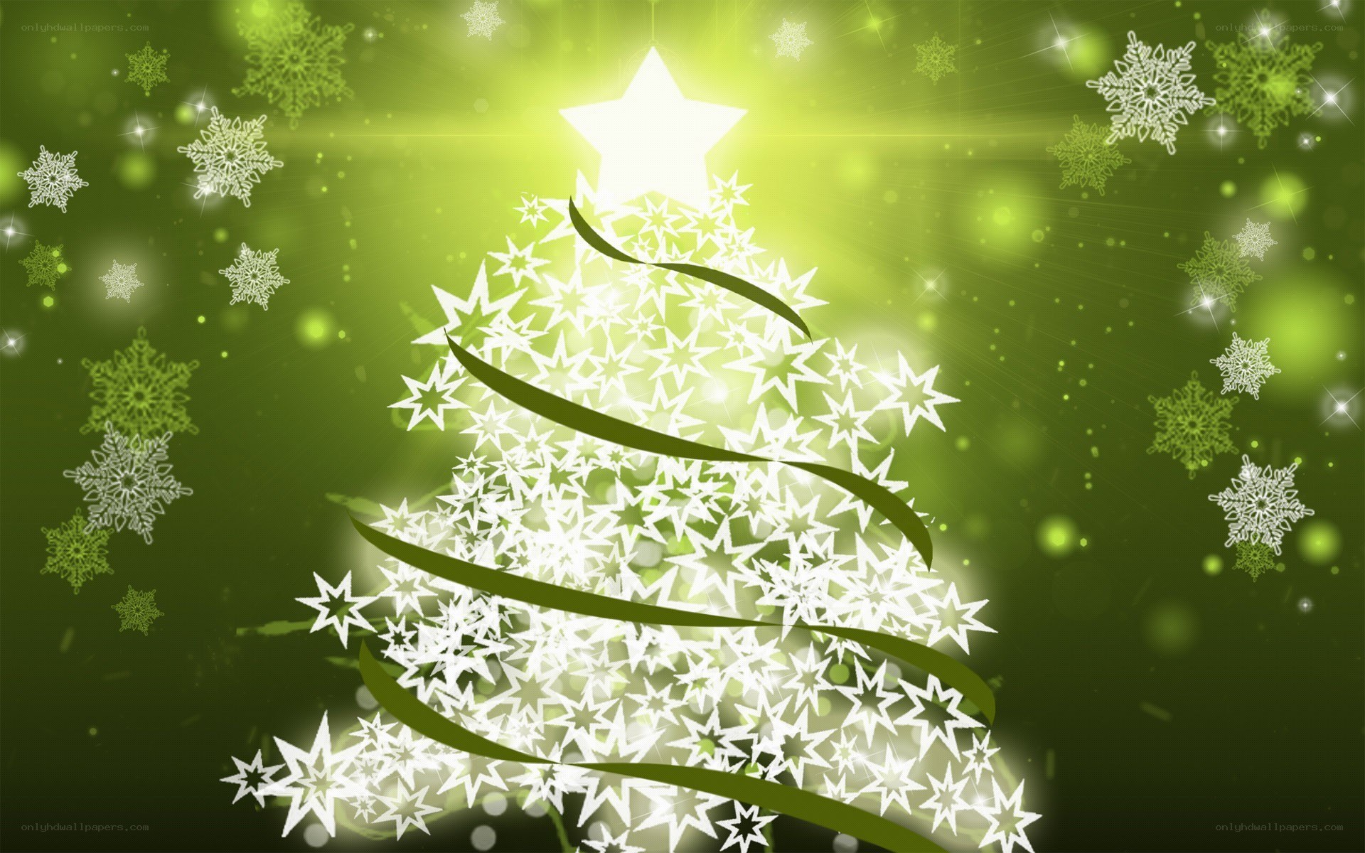 green christmas tree with snowflakes
