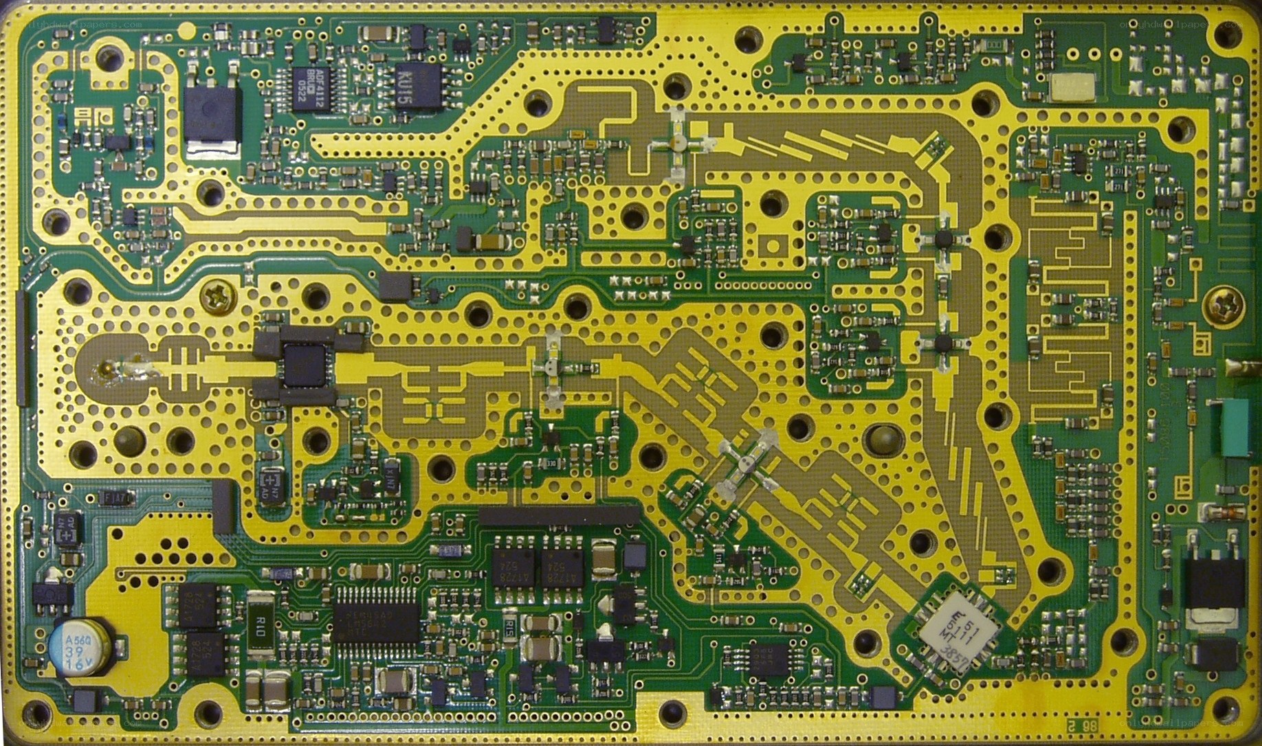 green circuit board with components