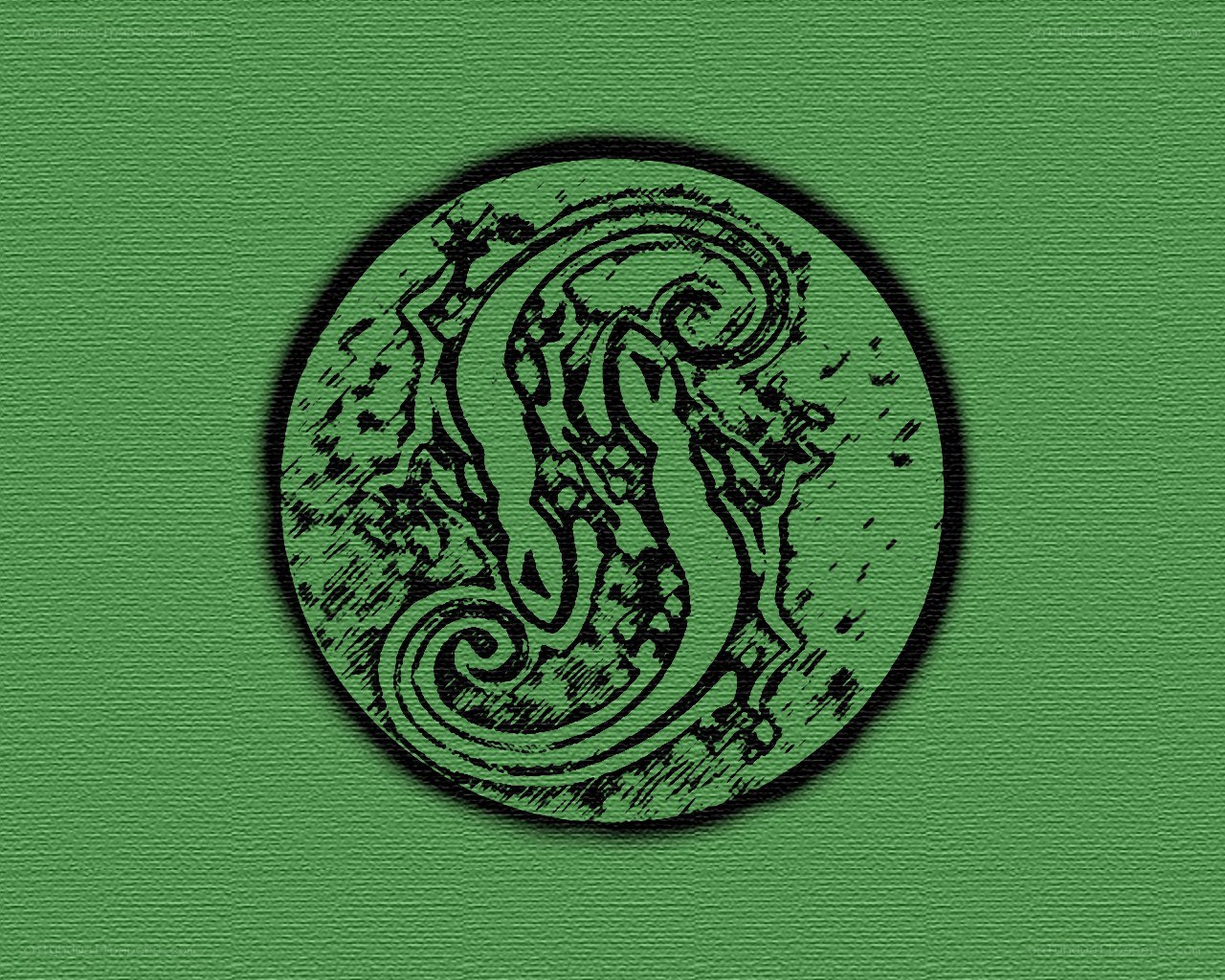 green circular emblem with lizard design